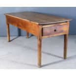 A 19th Century French Fruitwood Kitchen Table, the plain four-plank top with angled corners,