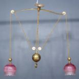 A Late Victorian/Early 20th Century Arts and Crafts Brass Two-Light Rise and Fall Ceiling Electric