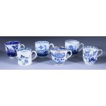 A Small Collection of English Porcelain Blue and White Cups and Tea Bowls, 18th Century, including -