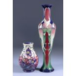 A Moorcroft Pottery Vase with "Trinity" design, by Philip Gibson, 12.5ins high, and Philip Gibson