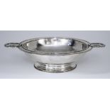 A George V Planished Silver Circular Two-Handled Bowl, by Omar Ramsden, London 1921, with moulded