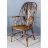 A 19th Century Ash and Elm Seated Wheelback Windsor Armchair, with two-tier stick back, on turned