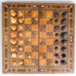 An English Mahogany Chessboard, 19th Century, the board of mahogany and satinwood squares, with a