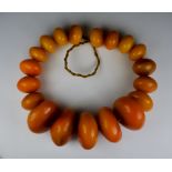 A String of Casein Resin Beads circa 1920, North African origin, weight 850g