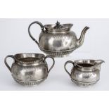 A Late Victorian Bachelors Silver Three-Piece Tea Service, by The Goldsmiths' Alliance Ltd, London