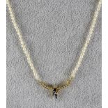 A Sapphire, Diamond and Seed Pearl Necklace, Modern, in 18ct gold mount, set with three small