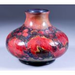 A Moorcroft Pottery Vase of Squat Form, Circa 1928-1934, decorated with a leaf and fruit design