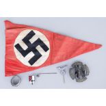 A German World War II Desk or Motoring Pennant, 9ins x 5ins, SS breast badge marked with enamelled