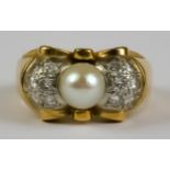 A Pearl and Diamond Ring, Modern, in 18ct gold mount, set with centre pearl approximately 6mm