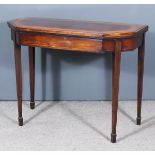 A George III Mahogany Card Table, with canted front corners, the green baize lined folding top