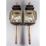 A Pair of Steel and Brass Black-Painted Carriage Lamps, 19th Century, with later steel brackets, now