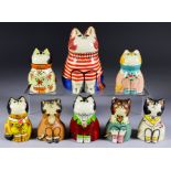 Eight Bethel Pottery, Plaster and Resin Cat Models, including female cat wearing red striped jumper,