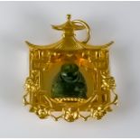 A Temple and Buddha Pendant, Modern, 14ct gold, the temple set with carved jade seated Buddha,