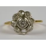 A Diamond Flowerhead Ring, Modern, 18ct Yellow Gold, set with a centre brilliant cut white