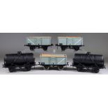 Five Gauge 1 Grey Finish Wagons, Four Black Finish Liquid Wagons, and a selection of electronic