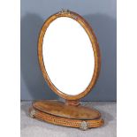 A Victorian Burr Walnut and Gilt Metal Mounted Oval Toilet Mirror of "Neo Classical" Design,