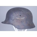 A German World War II Helmet, painted, with single Luftwaffe decal