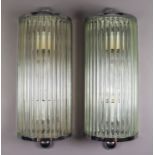 A Pair of Chromium Plated and Glass Semi-Circular Wall Lights of "Art Deco" Design, with reeded