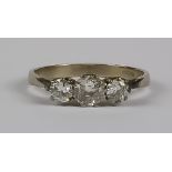 A Three Stone Diamond Ring, Modern, in 18ct white gold mount, set with three brilliant cut white