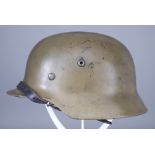 A German World War II Helmet, painted, no decals