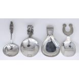 A George V Silver Caddy Spoon and Three Elizabeth II Silver Caddy Spoons, the George V spoon by
