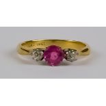 A Ruby and Diamond Ring, Modern, in 18ct gold mount, set with a centre faceted ruby,