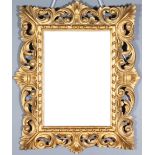 An Italian Florentine Rectangular Wall Mirror, Late 19th/Early 20th Century, the mirror frame boldly