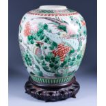 A Chinese Porcelain Famille Verte Jar, 19th Century, enamelled with birds amongst branches, 11.