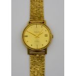 A Bulova Ambassador Automatic Wristwatch, 9ct Gold Cased, 35mm diameter, the gold dial with gold