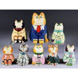 Eight Bethel Pottery, Plaster and Resin Cat Models, including male cat wearing pin striped suit