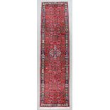 Two Persian Runners, Mid 20th Century, the Bidjar runner woven in colours, the field filled with