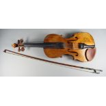 A German Violin after Stradivarius, Late 19th Century, with two piece back and spurious paper