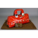 A Gucci Red Leather Handbag, with paperwork and brown drawstring bag with Gucci name in gilt