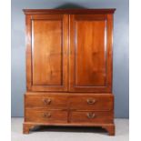 A George III Gentleman's Mahogany Wardrobe, the upper part with moulded cornice, fitted hanging rail