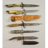 Nine Continental 20th Century Hunting Knives, five with leather scabbards