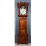 A Mid 19th Century Figured Mahogany Longcase Clock, by John Latham of Macclesfield, the 14ins arched