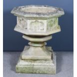 A Stone Composition Octagonal Planter on Stepped Base, 20th Century, the sides cast with