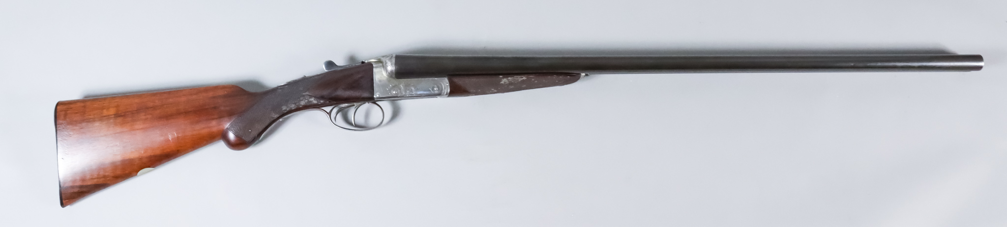 A 12 Bore Side by Side Box Lock Shotgun, by Midland Gun Company, Serial No. 109576, the 28ins