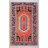 A Hamadan Rug, Early to Mid 20th Century , woven in colours of navy blue, wine and fawn with a