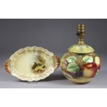 A James Skerrett Bone China Table Lamp painted with Fruit, signed, 8.75ins high, with shade, and a
