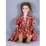 An Armand Marseille Bisque Doll, No. 390, Late 19th Century, with brown closing eyes and open