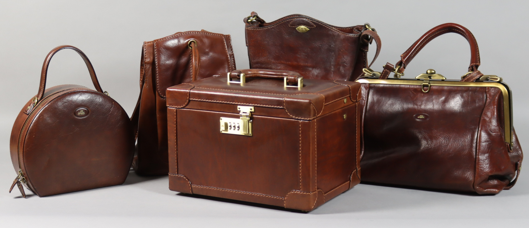 A Selection of The Bridge Brown Leather Bags, including - a rectangular vanity case, 11ins x 8ins