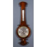 A Victorian Walnut Cased Wheel Barometer and Thermometer, by C. W. Dixey, 3 New Bond Street, London,