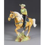 A Beswick Pottery American Mounted Cowboy, designed by Graham Orwell, model no. 1377, impressed