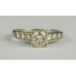 A Diamond Ring, Modern, platinum, set with a centre brilliant cut diamond, approximately .75ct,