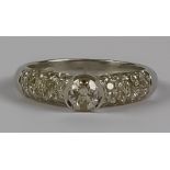 A Diamond Ring, Modern, 18ct white gold, set with a centre brilliant cut round diamond,