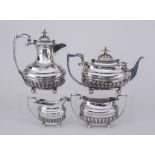 A George VI Silver Rectangular Four-Piece Tea Service, by Walker & Hall, Sheffield 1937 and 1951,