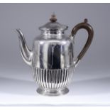 A Late Victorian Silver Cylindrical Coffee Pot, by Walter & John Barnard, London 1889, with part