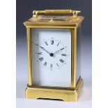 A Late 19th Century French Gilt Brass Carriage Clock, the white enamel dial with Roman numerals,