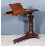 A Late Victorian Mahogany Adjustable Bed Table, by Levenson & Sons, the rectangular tray top with
